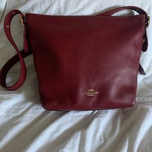 Used coach cherry red color & large crossbody bag!